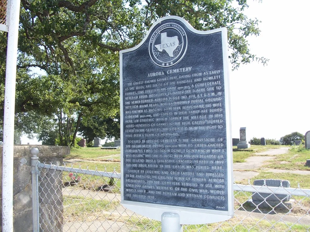Historic cemetery plaque at Aurora, Texas, site of the 1897 airship crash report
