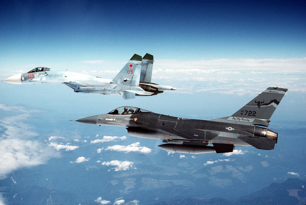 Soviet Su-27 alongside a NATO F-16 — General Maltsev commanded the air defense forces whose radar systems tracked the UAP he described in his 1990 official statement