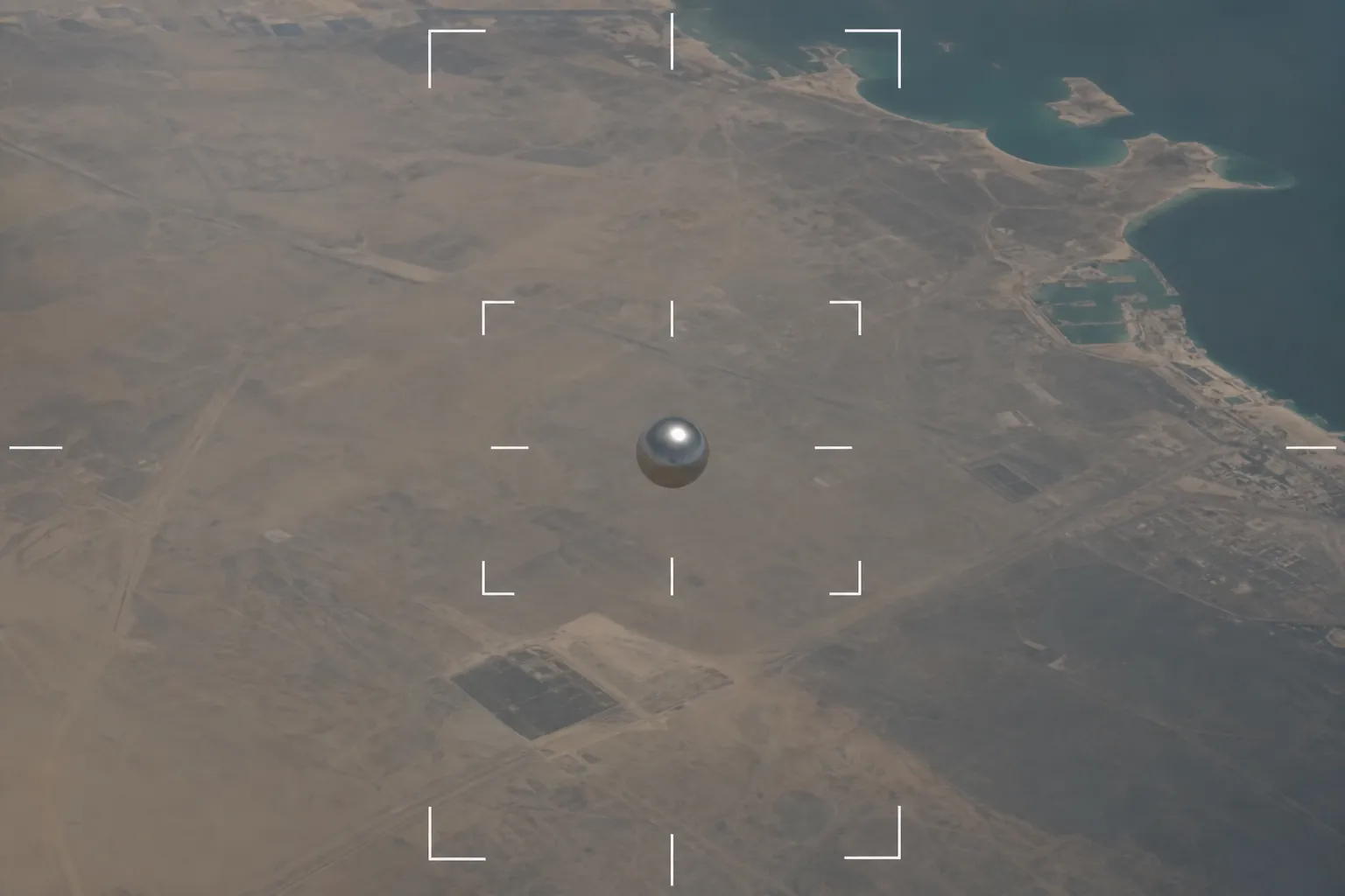 AI-rendered impression — a shimmering metallic silver orb tracked by a Reaper drone's targeting camera over Gulf airspace, July 2022
